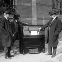Edwin S. Votey presents his first limited production model of piano-player, later called the Pianola (1922).