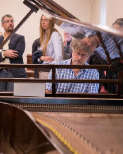 Visitors in the piano gallery